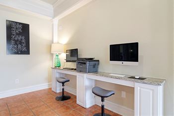 Business center with 2 computers.